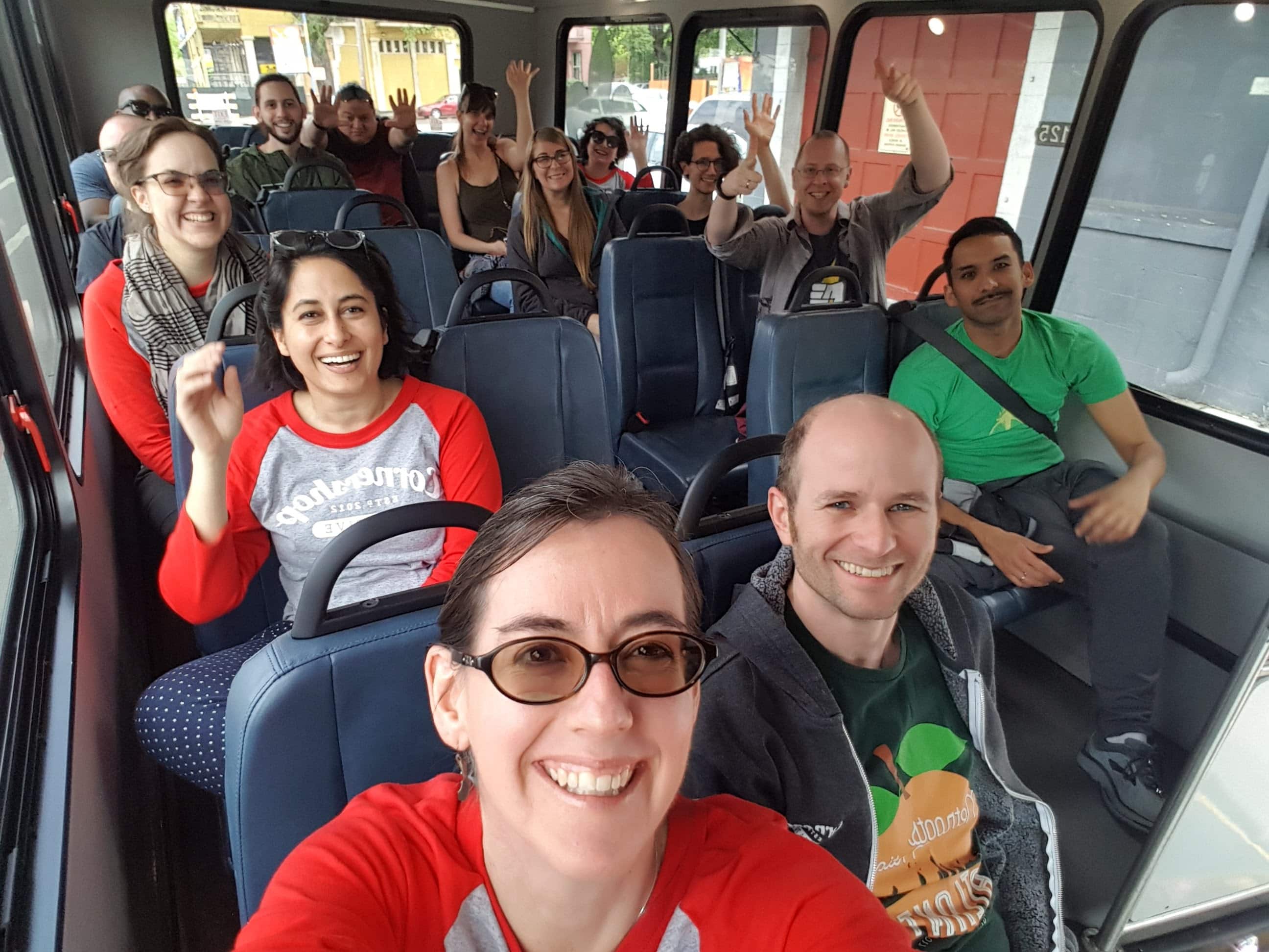 Group picture of the Cornershop team in matching red and gray shirts on our way to another event (not to the Bridge Conference, but still fun!)