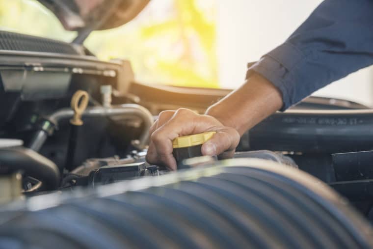 A mechanic maintains a vehicle, similar to how we need to regularly maintain websites to make sure they're performing well