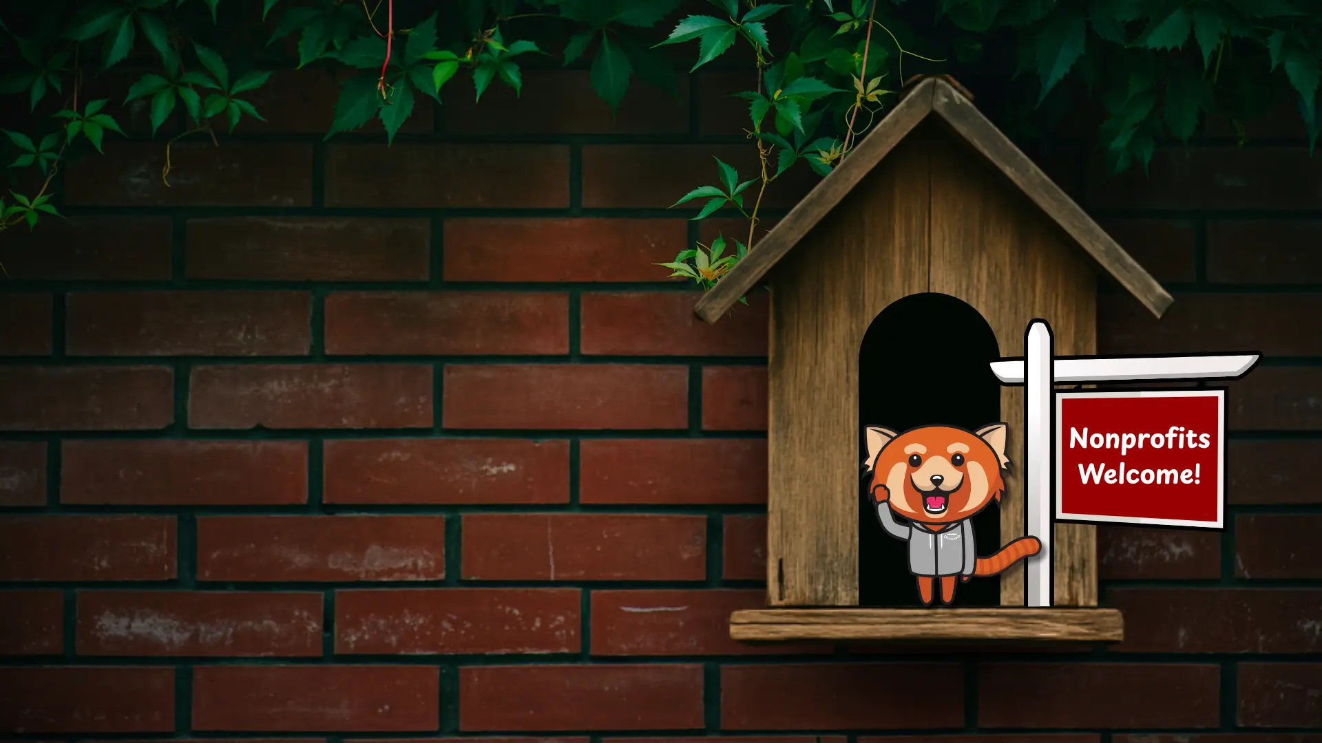 Rowdy the red panda is standing in front a bird house with a sign that says "Nonprofits Welcome"