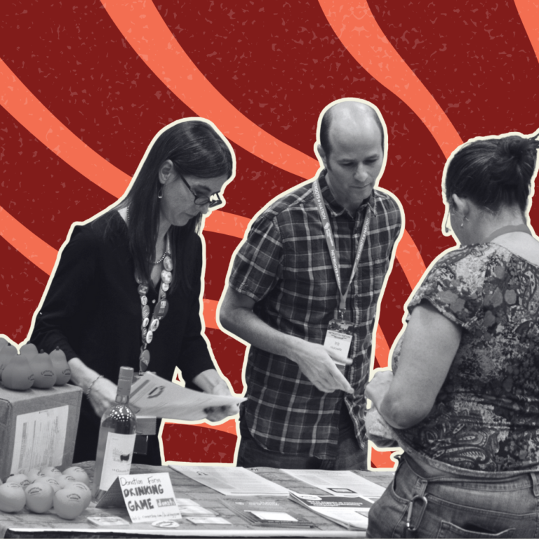 Ira and Lesley discussing Cornershop at a Conference