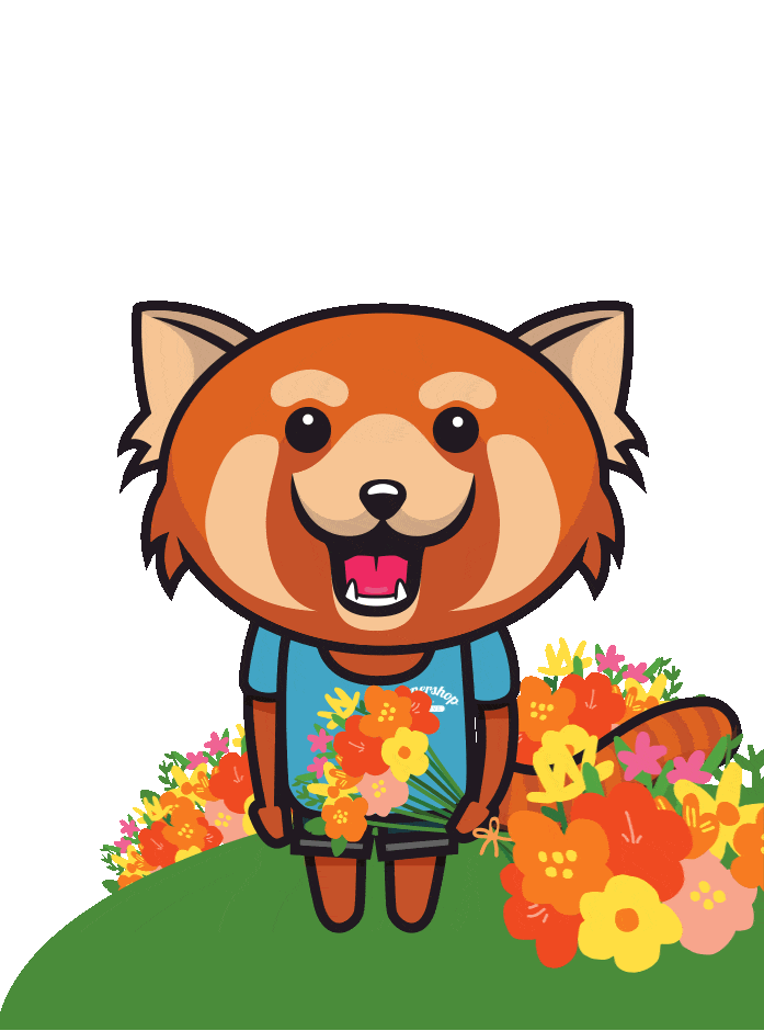A cartoon red panda wearing a blue shirt stands on grass, smiling and holding a bouquet of colorful flowers. More flowers are arranged on the ground nearby.