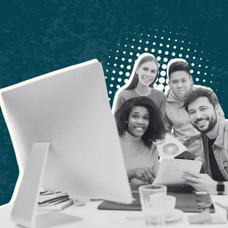 A group of people gathered around the computer